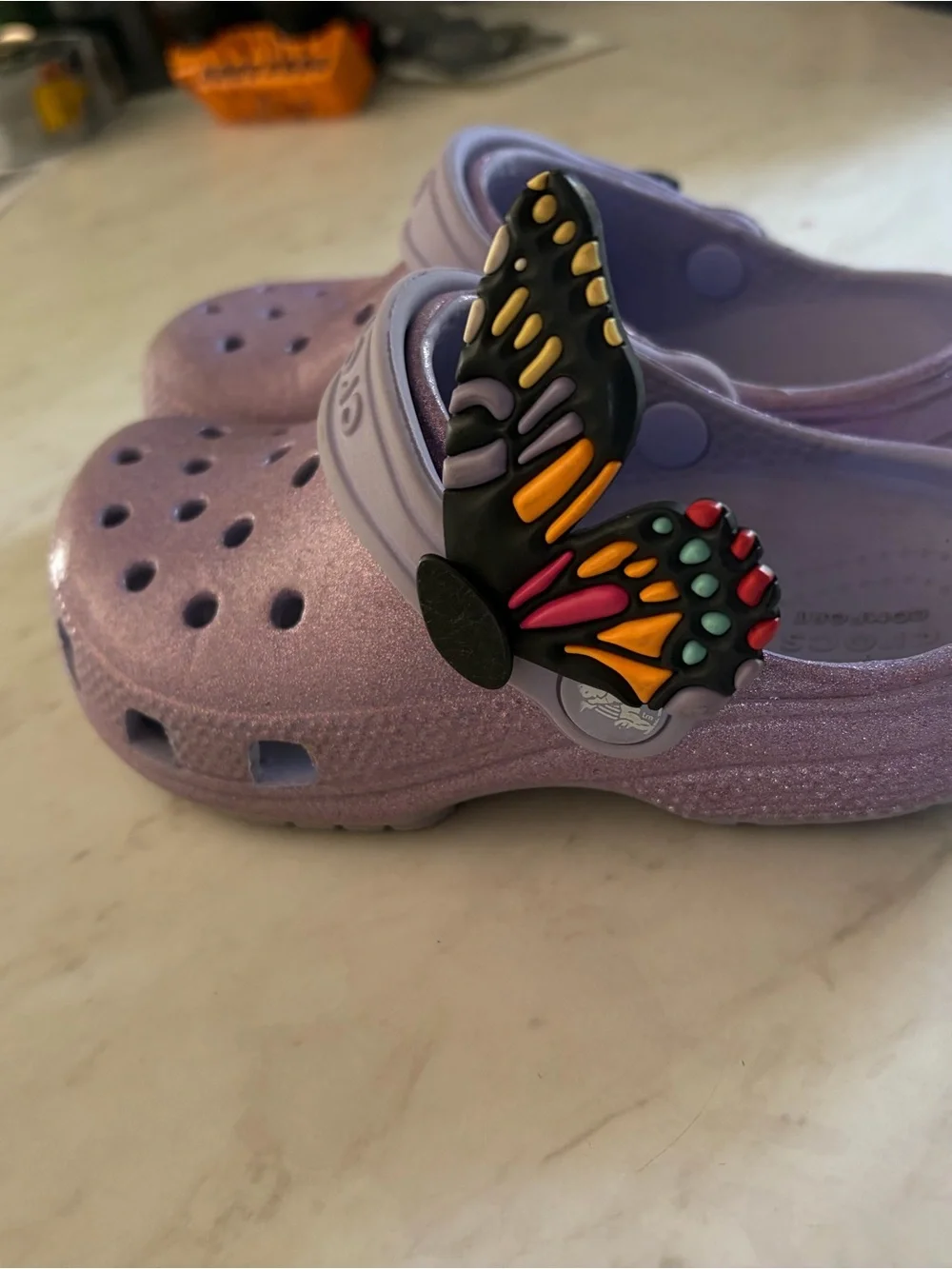 CROCS Kids' Glitter Classic Clog in Lavender